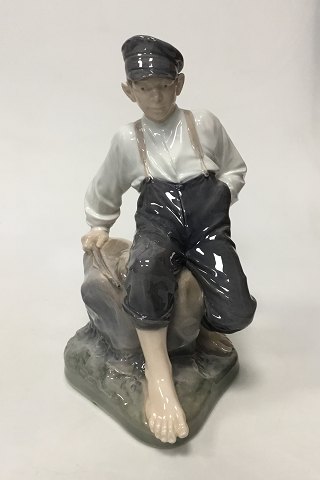 Royal Copenhagen Figurine Boy on Rock No. 1659