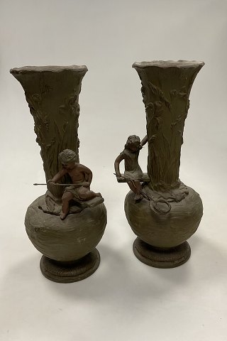 Art Nouveau Pair of Vases in Metal of young boy and girl