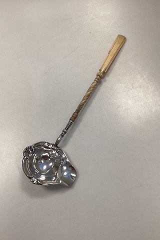 Danish soup ladle in provincial silver with ivory handle