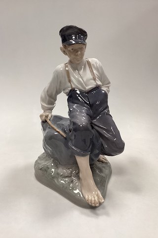 Royal Copenhagen Figurine Boy on Rock No. 1659