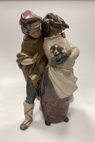 Lladro Stoneware Figurine of Girl and Boy with Dog - Facing the Wind