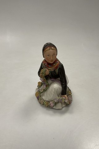 Royal Copenhagen Overglaze figurine of Amager Flower Girl No. 12412