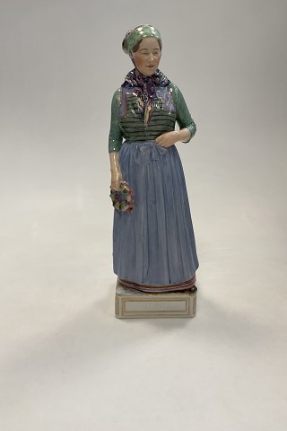 Royal Copenhagen Overglaze Figurine of Refsnæs Woman No. 12166